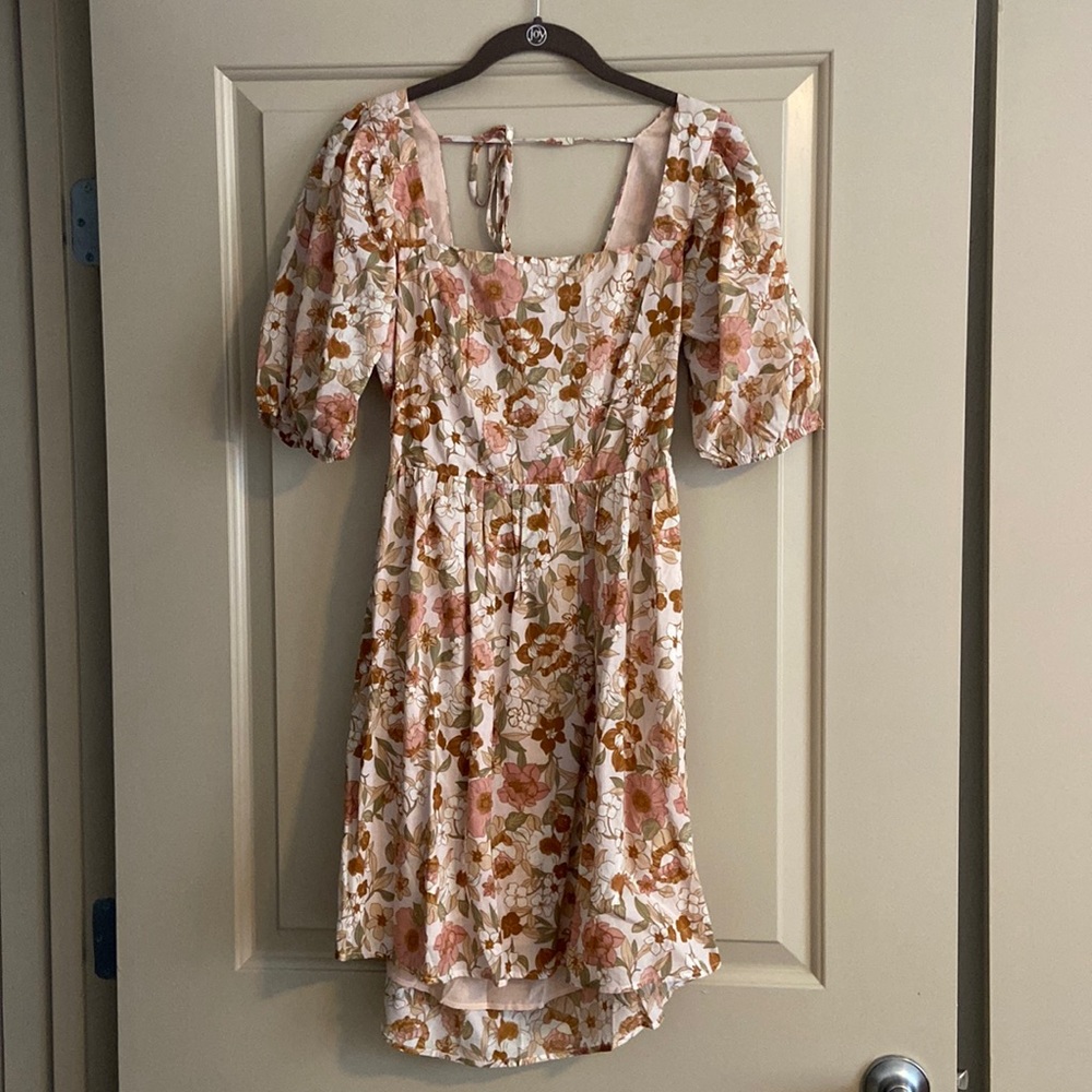New, tags were removed, floral dress.